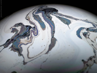 Illustration for article titled Photos of Soap Bubbles that Look Like Trippy Exoplanets